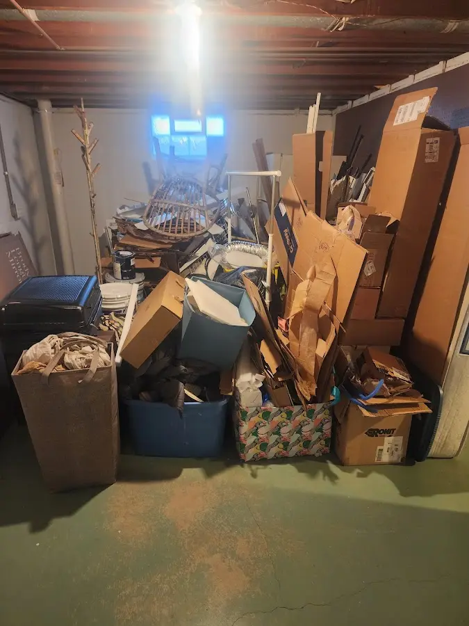 Roll-off dumpster container at job site for Concrete Dumpster Rental in Tecumseh